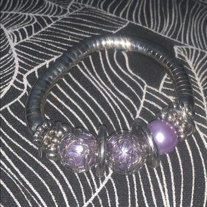 Cute bracelet that is silver and purple!